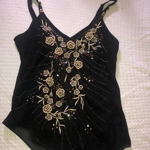 Beautiful tank top with floral sequins. Size 12 . Dress up or down